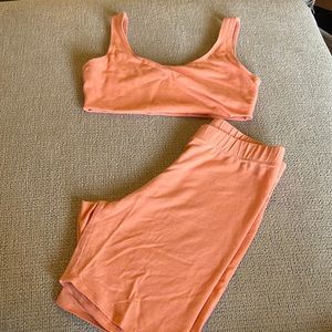 Salmon color sport bra and biker short